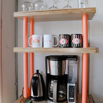 Branded mugs and coffee station